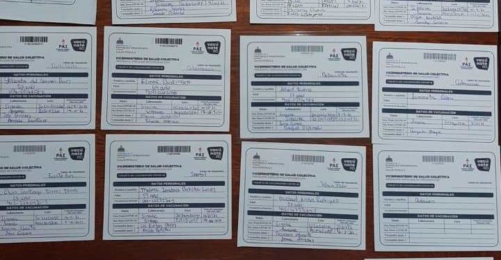 Desmantelan centro de falsificaciones de tarjetas de vacunación COVID 19 en el Cibao Central